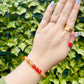 gemstone bracelet on womans writst. carnelian and citrine