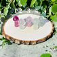 Fluorite Mushrooms crystals on wooden stump outside